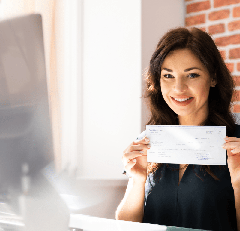 business woman showing payslip to streamline global payroll processes