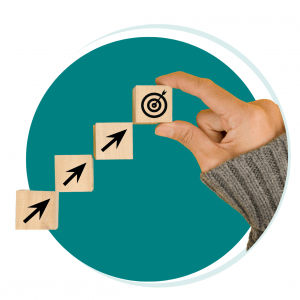 mage showing three dice stacked vertically, with an arrow pointing upwards. The top die features a target symbol, symbolizing how global payroll management can help your company achieve its goals.